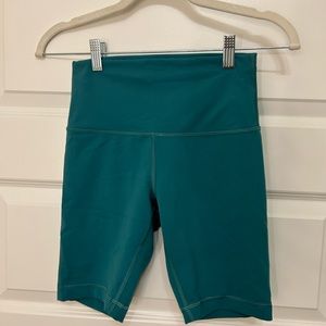 Lululemon size 4 biker shorts teal color